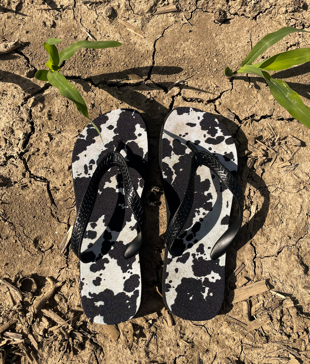 Black Cowhide Flip Flops